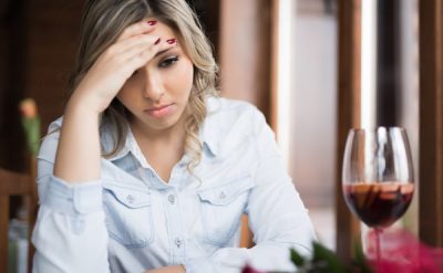 young woman sitting in front of sangria